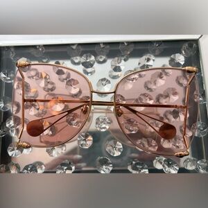 Gucci Gold Frame Sunglasses with Pink Lenses